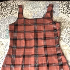Pink plaid dress with a slit great body shaping and size M could fit a large